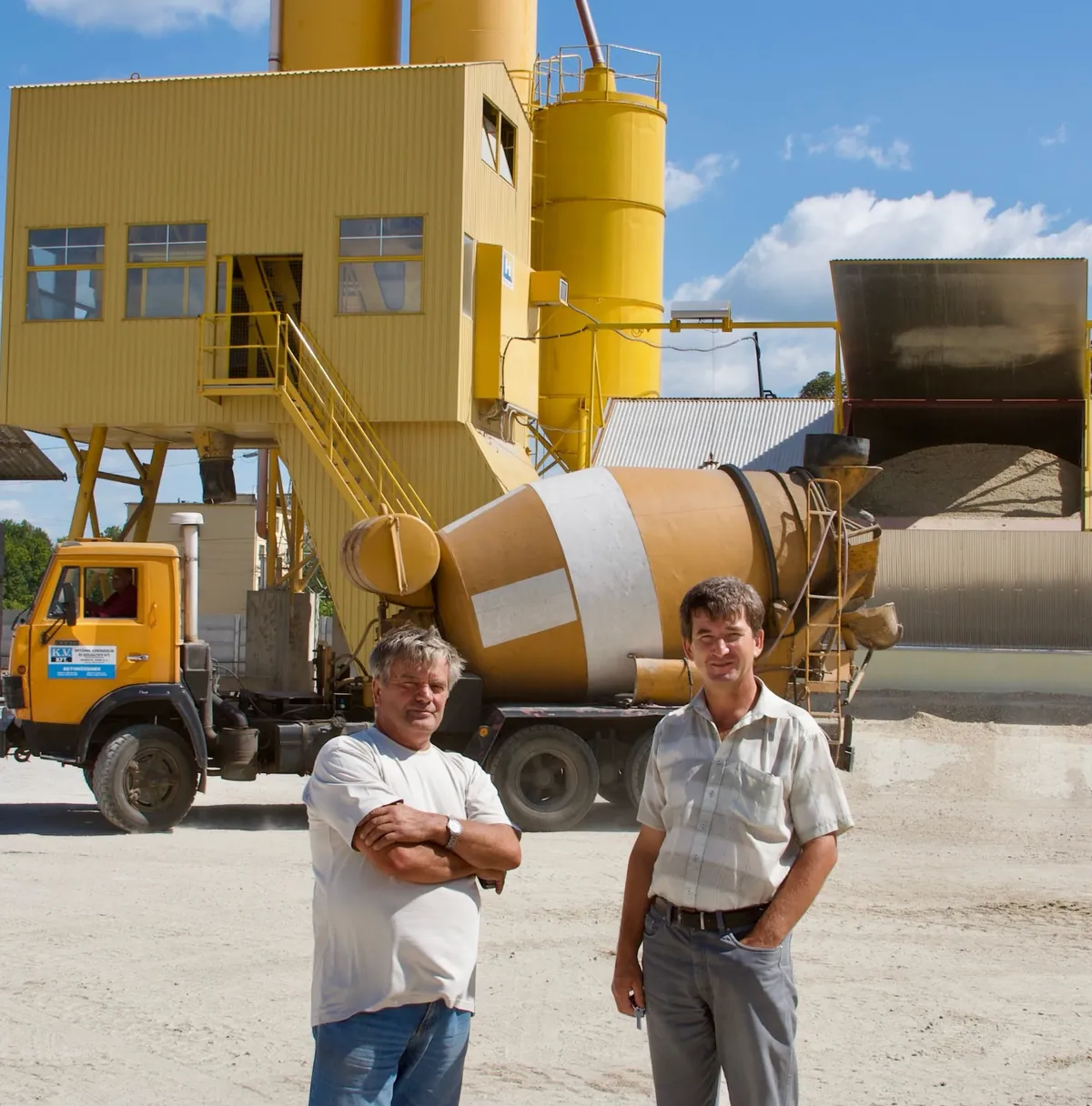 1998 — at our concrete batching plant, in front of a K.V. mixer truck